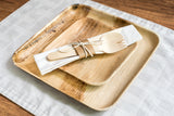 Birch wood cutlery kit on palm leaf plates