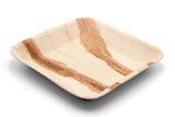 Deep 9 inch square palm leaf plate at angle